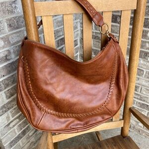 Oversized faux leather whipstitch bag